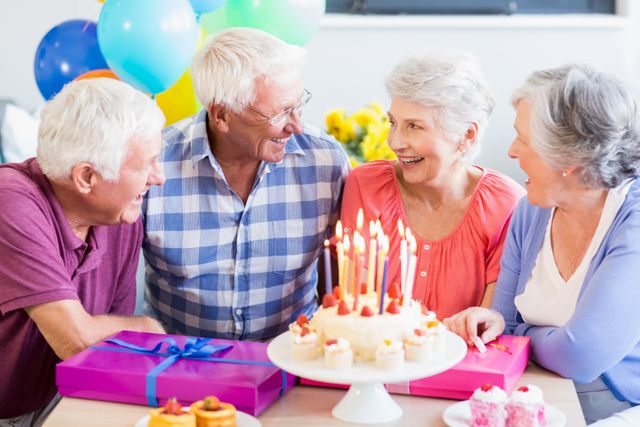 Seniors celebrating a birthday - Download Free Stock Photos Pikwizard.com