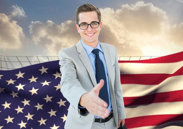 Digital composite of smiling businessman offering his hand for a handshake against american flag