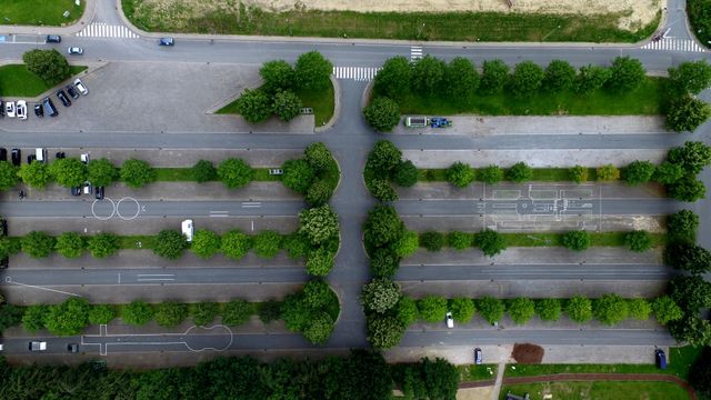 Aerial Photography of Parking Lot With Trees - Download Free Stock Photos Pikwizard.com