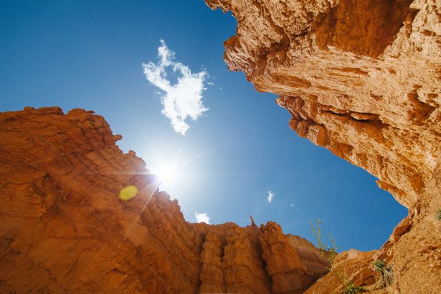 Looking Up Red Rock Desert Cliffs To The Sun - Download Free Stock Photos Pikwizard.com