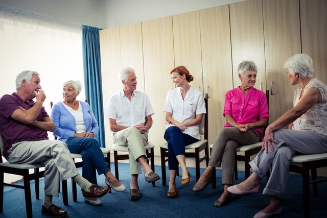 Seniors interacting with nurse - Download Free Stock Photos Pikwizard.com