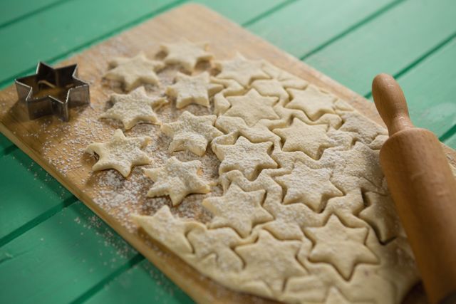 Close up of star shape cookies on cutting board at table