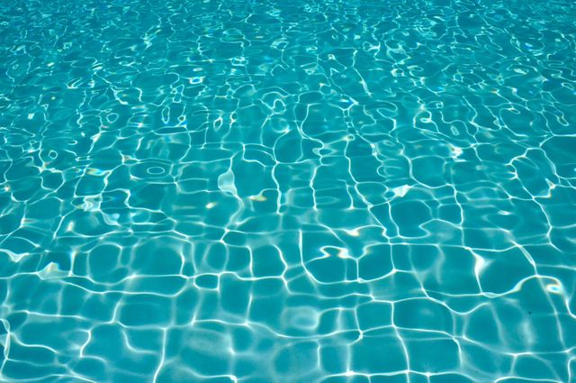 a pool with clear water - Download Free Stock Photos Pikwizard.com