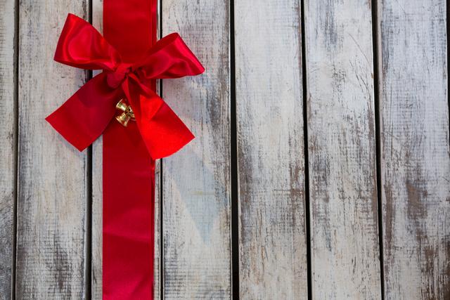 Red ribbon tied on wooden plank - Download Free Stock Photos Pikwizard.com
