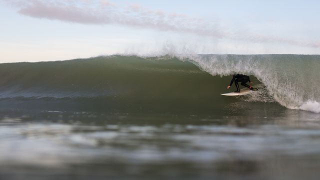 Man in Black Wet Suit Surfing Waves - Download Free Stock Photos Pikwizard.com
