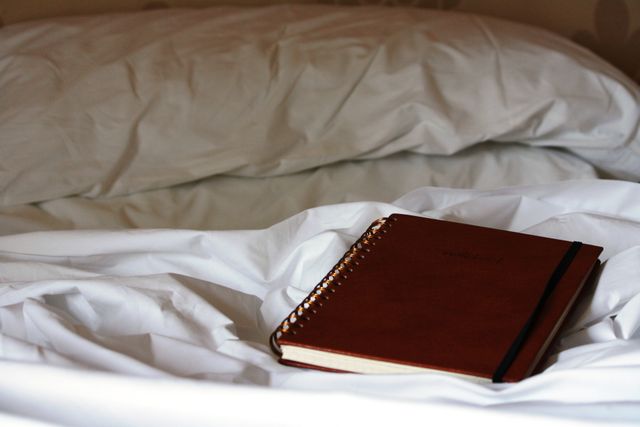 Bed daily notebook reflection - Download Free Stock Photos Pikwizard.com
