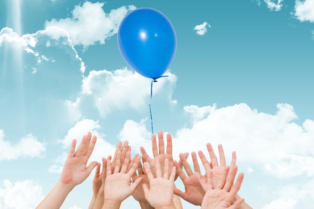 Hands reaching to blue balloon - Download Free Stock Photos Pikwizard.com