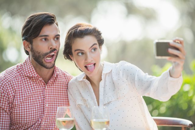 Couple taking a selfie - Download Free Stock Photos Pikwizard.com
