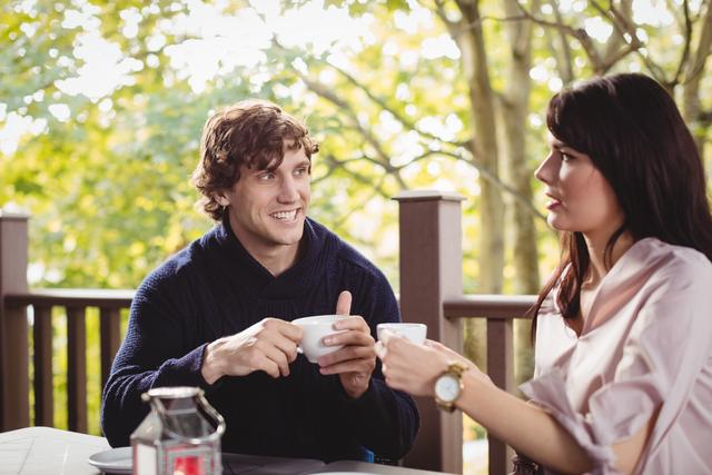 Couple having coffee together- Download Free Stock Photos Pikwizard.com