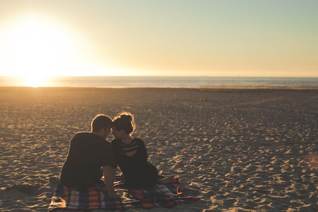 Sunset beach couple love - Download Free Stock Photos Pikwizard.com