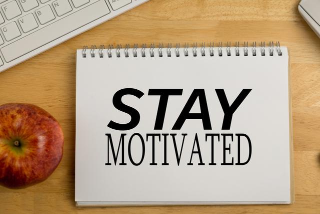Stay motivated message on a notebook - Download Free Stock Photos Pikwizard.com