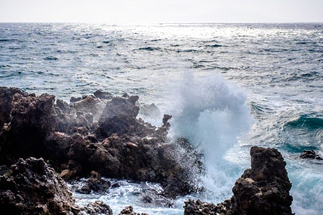 Waves Crashing on Rocks at Shore during Daytime - Download Free Stock Photos Pikwizard.com