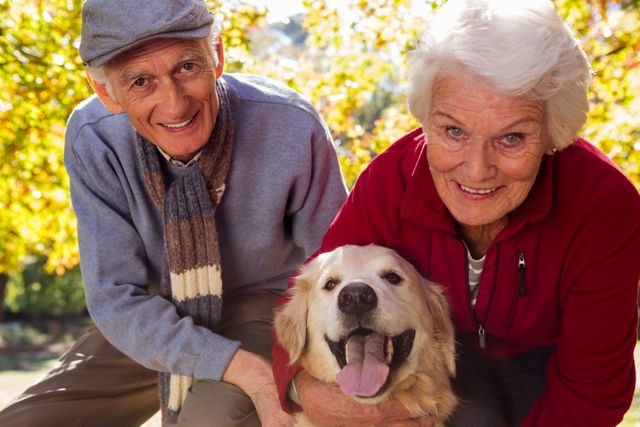 Elderly couple with their pet dog- Download Free Stock Photos Pikwizard.com
