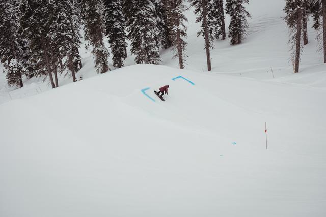 Man skiing on snowy alps in ski resort - Download Free Stock Photos Pikwizard.com