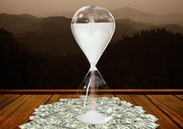 Currency flowing through hour glass on wooden plank against mountains in background - Download Free Stock Photos Pikwizard.com
