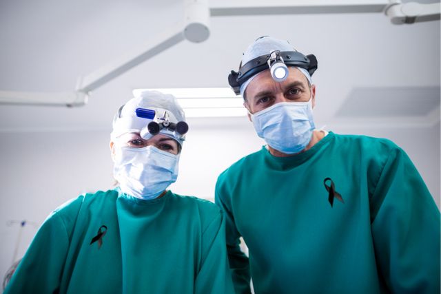 Portrait of male and female surgeon wearing mask in the hospital - Download Free Stock Photos Pikwizard.com