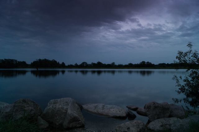Lake at cloudy sunset - Download Free Stock Photos Pikwizard.com