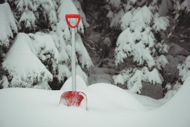 Shovel in a snowy landscape - Download Free Stock Photos Pikwizard.com