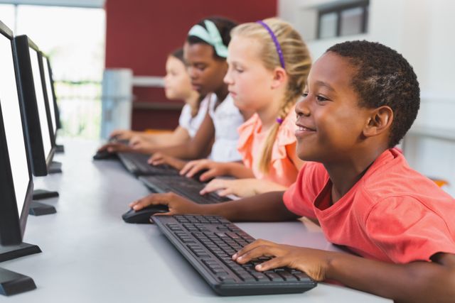 School kids using computer in classroom - Download Free Stock Photos Pikwizard.com