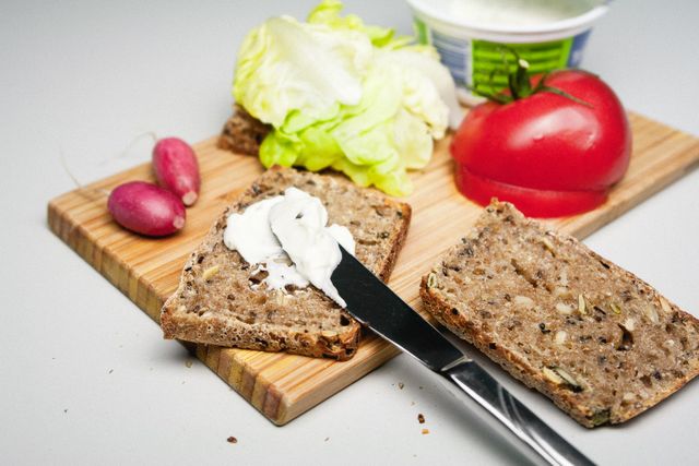 a cutting board with various foods from Pikwizard