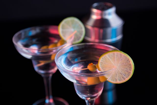 A Martini Glass On A Black Background Stock Photo - Download Image