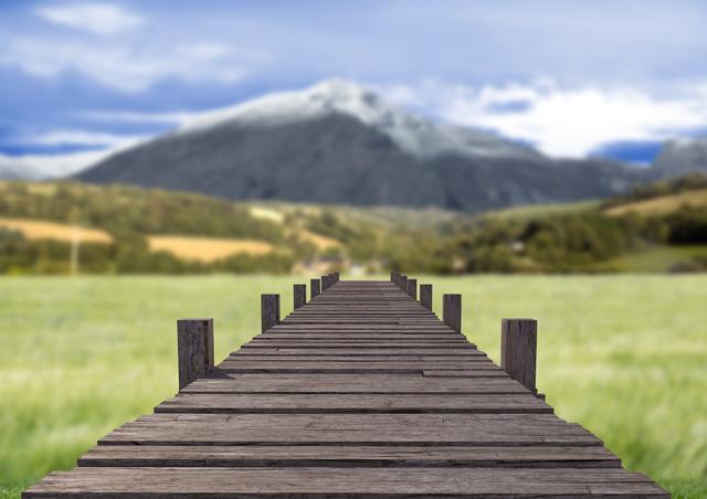 Wooden walkway against countryside landscape - Download Free Stock Photos Pikwizard.com