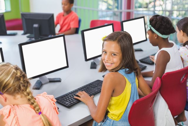 School kids using computer in classroom - Download Free Stock Photos Pikwizard.com