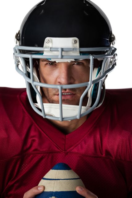 Portrait of determined American football player wearing helmet - Download Free Stock Photos Pikwizard.com