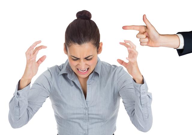 Hand blaming stressed woman against white background