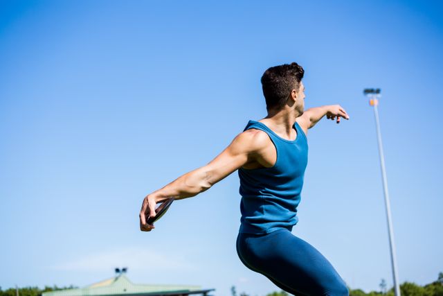 Athlete about to throw a discus - Download Free Stock Photos Pikwizard.com