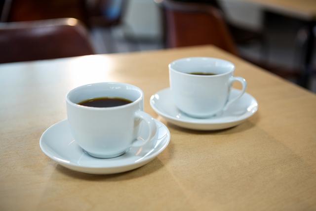 Black coffee on a table - Download Free Stock Photos Pikwizard.com