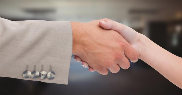 Close-up of handshake in office - Download Free Stock Photos Pikwizard.com