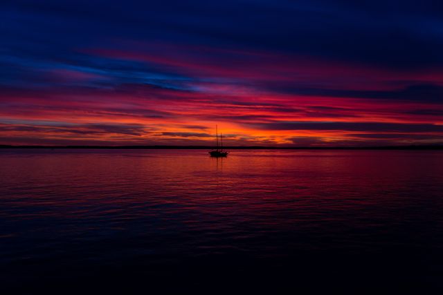 Seascape boat sunset clouds - Download Free Stock Photos Pikwizard.com