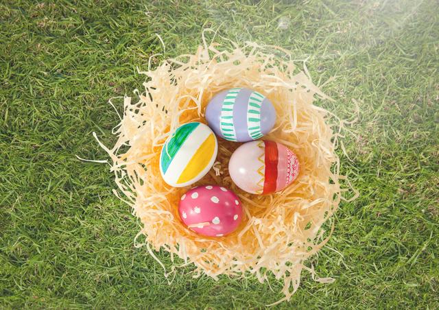 Easter eggs in nest on grass - Download Free Stock Photos Pikwizard.com