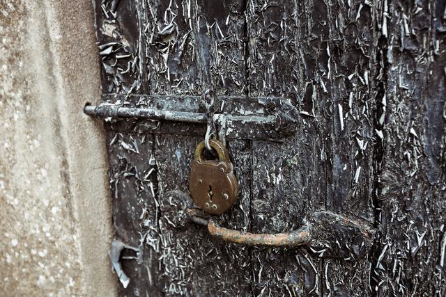 Old door with paint peelings and lock - Download Free Stock Photos Pikwizard.com