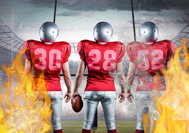 American football players standing with ball against flames and stadium in background - Download Free Stock Photos Pikwizard.com
