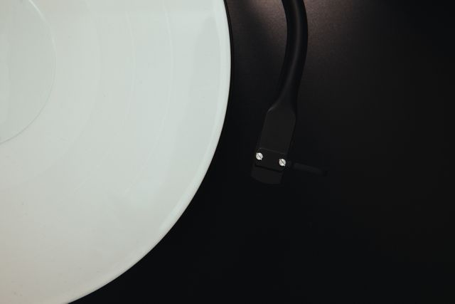 Close up of Retro styled spinning record vinyl player. Music and Retro technology concept