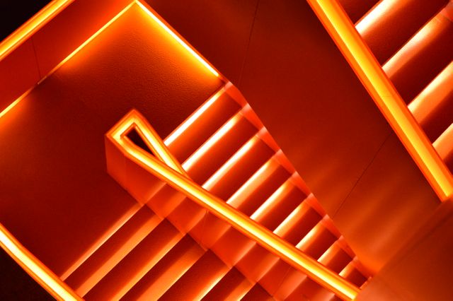 overhead view of Modern minimalistic illuminated stairs.  futuristic architecture concept