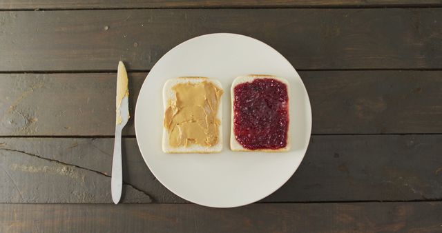 Knife and Sandwich with Bread and Peanut Butter Stock Photo