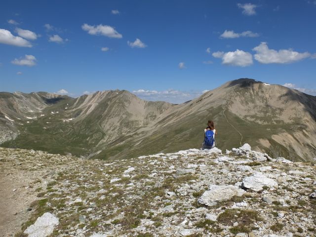Woman standing on mountain - Download Free Stock Photos Pikwizard.com