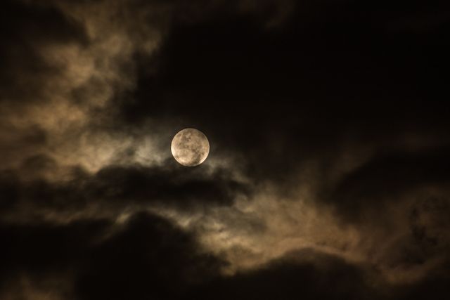 the moon in the clouds - Download Free Stock Photos Pikwizard.com
