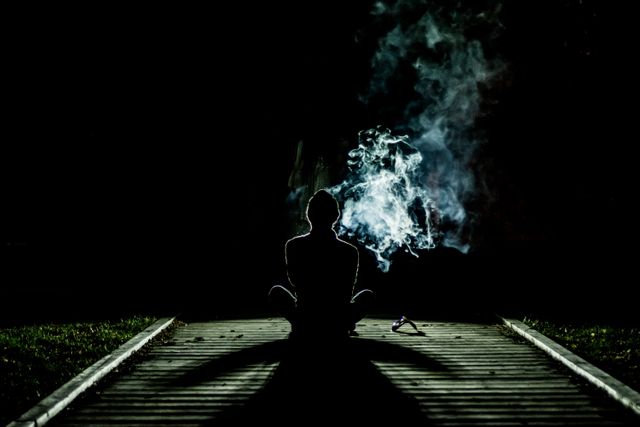 Smoke man meditation night - Download Free Stock Photos Pikwizard.com