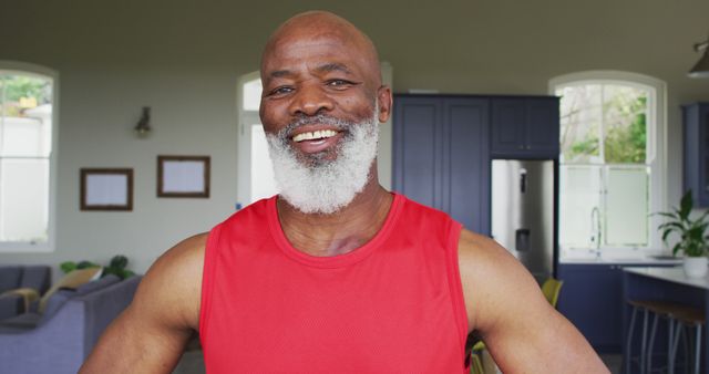 Portrait of african american senior man smiling at home - Download Free Stock Photos Pikwizard.com