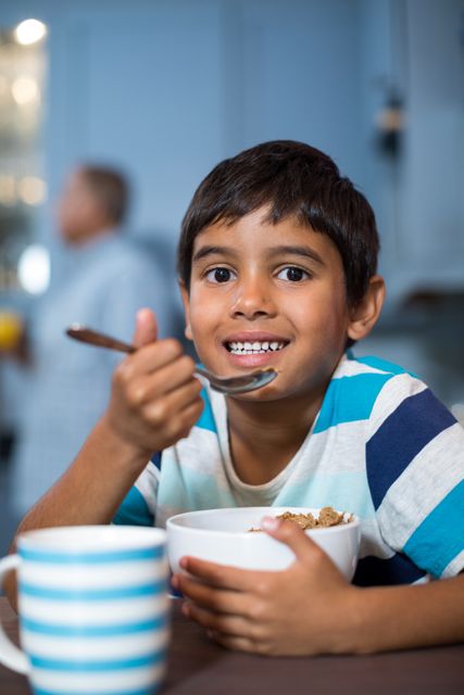 Close up portrait of boy having breakfast - Download Free Stock Photos Pikwizard.com