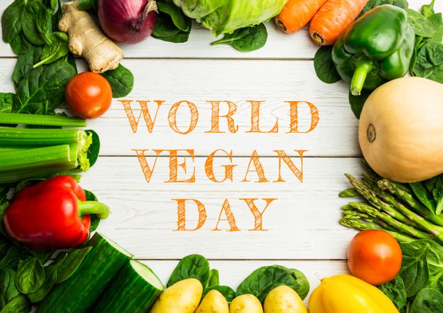 Directly above view of world vegan day text amidst fresh vegetables arranged on wooden table - Download Free Stock Photos Pikwizard.com