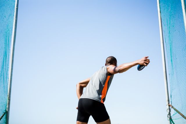 Athlete about to throw a discus - Download Free Stock Photos Pikwizard.com