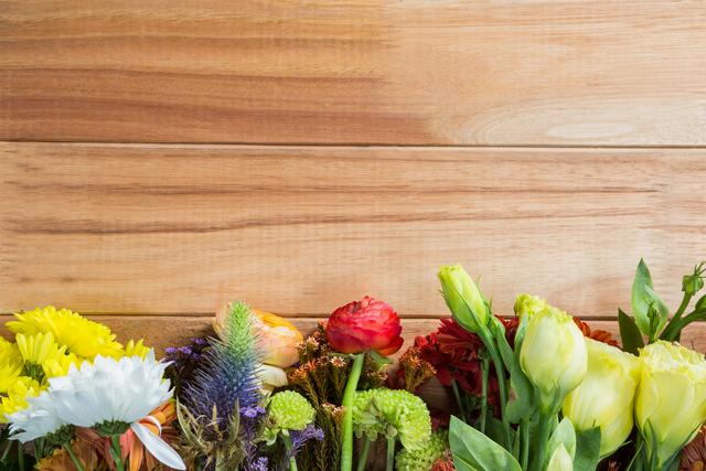 flowers arranged on wooden board - Download Free Stock Photos Pikwizard.com