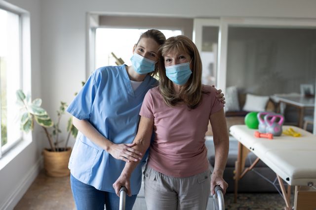 Portrait of female health worker and senior woman with walking frame at home - Download Free Stock Photos Pikwizard.com