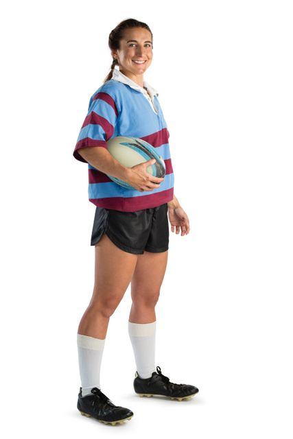 Full length portrait of happy young female player with rugby ball - Download Free Stock Photos Pikwizard.com