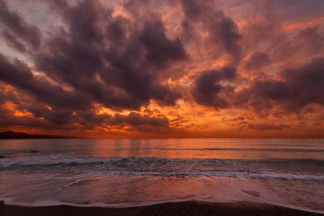a sunset over the ocean - Download Free Stock Photos Pikwizard.com